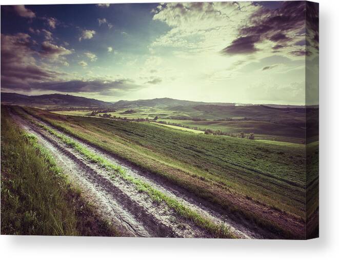 Steppe Canvas Print featuring the photograph Dirt Track In Tuscany by Xavierarnau