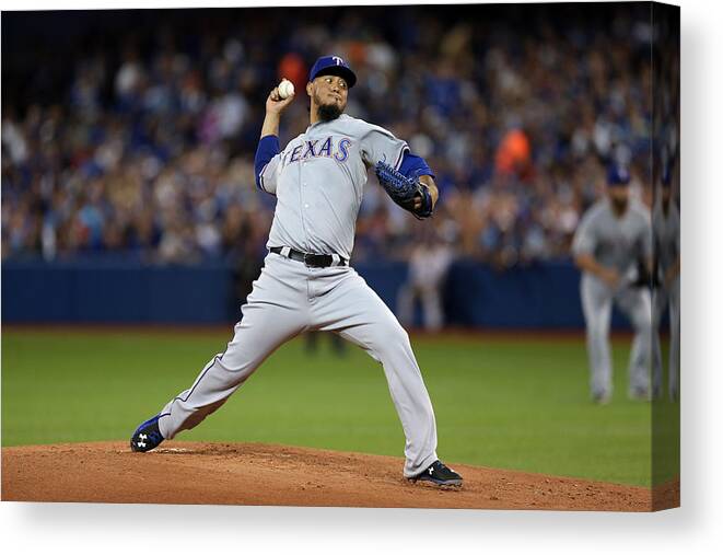American League Baseball Canvas Print featuring the photograph Division Series - Texas Rangers v Toronto Blue Jays - Game One by Vaughn Ridley