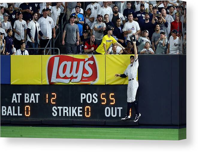 People Canvas Print featuring the photograph Divisional Round - Cleveland Indians v New York Yankees - Game Three by Al Bello