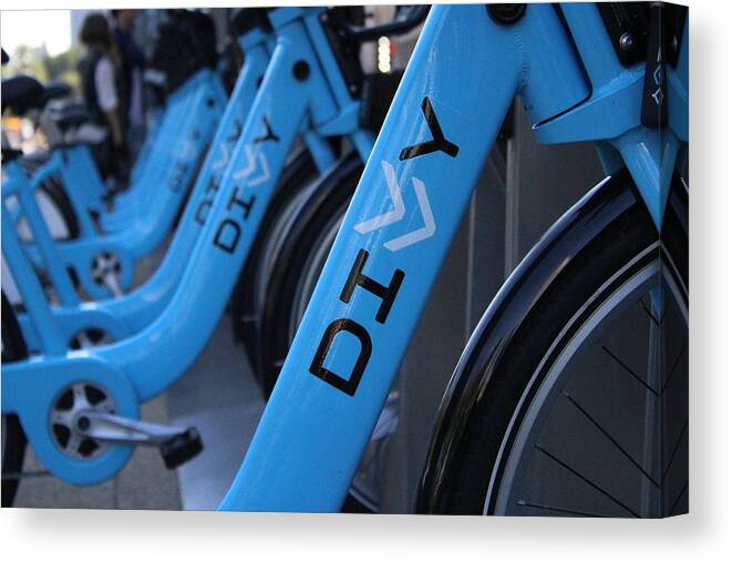 Divvy Bikes Chicago Illinois Downtown Ride Cycle Peddle Ride Transport Blue Black White Exercise Canvas Print featuring the photograph Divvy Bikes by Jarvis Edwards