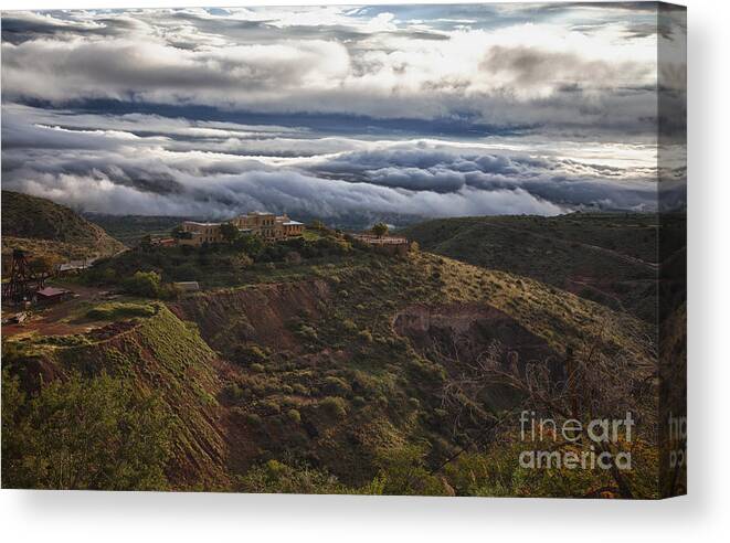 Jerome Arizona Canvas Print featuring the photograph Douglas Mansion with a sea of clouds by Ron Chilston