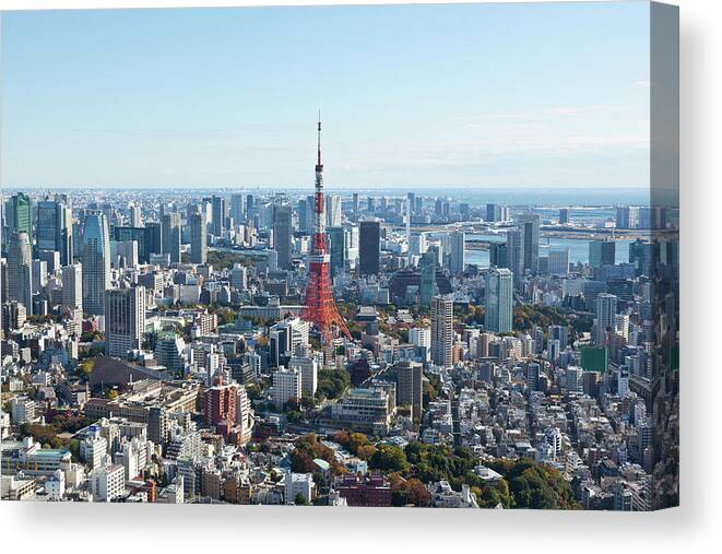 Tokyo Tower Canvas Print featuring the photograph Downtown Skyline With Tokyo Tower by Tom Bonaventure