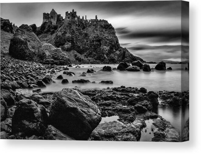 Dunluce Canvas Print featuring the photograph Dunluce Castle by Nigel R Bell