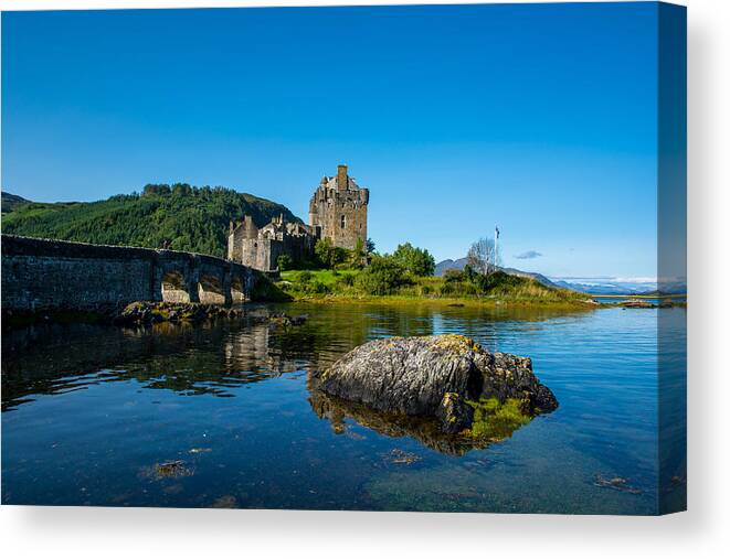 Scotland Canvas Print featuring the photograph Eilean Donan Castle In Scotland by Andreas Berthold