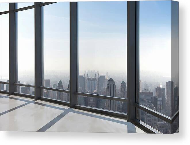 Empty Canvas Print featuring the photograph Empty Office Overlooking A City by Buena Vista Images