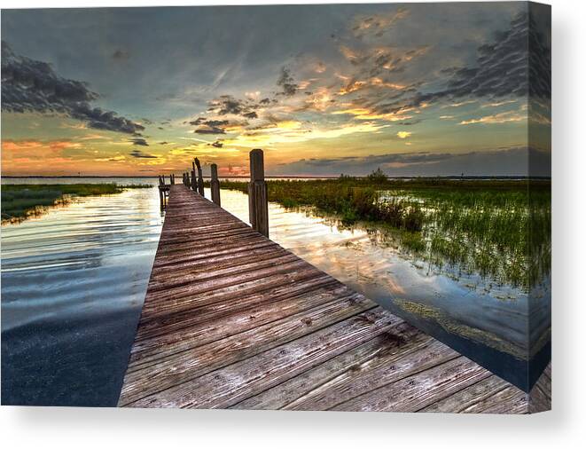 Clouds Canvas Print featuring the photograph Evening Dock by Debra and Dave Vanderlaan
