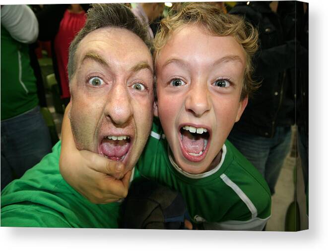 People Canvas Print featuring the photograph Father and son screaming by Dave G Kelly