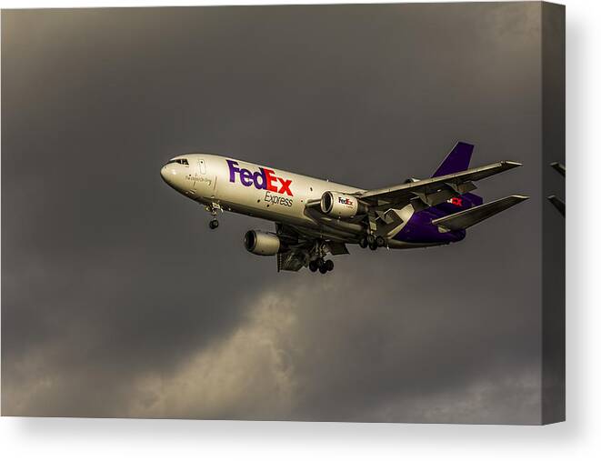 Jumbo Jets Canvas Print featuring the photograph FedEx 052 Heavy Cleared to Land by Marvin Spates