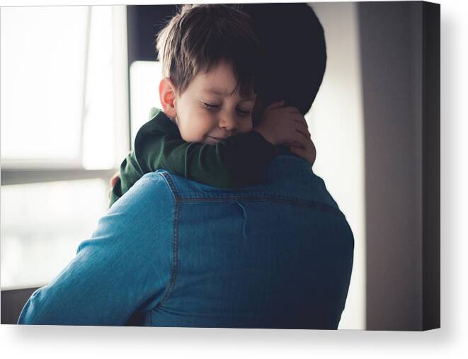 Child Canvas Print featuring the photograph Feeling happy in dad's arms by Georgijevic