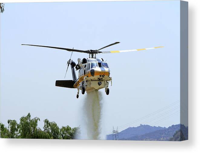 Aviation Canvas Print featuring the photograph Fire Hawk Water Drop by Shoal Hollingsworth