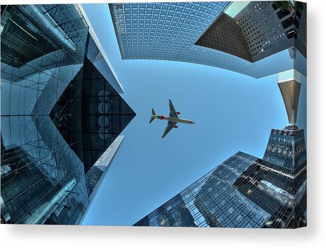 Fisheye Canvas Print featuring the photograph Fly Over by Marc Pelissier