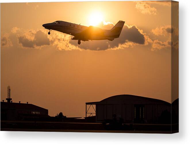 Aircraft Canvas Print featuring the photograph Flying Home by Paul Job
