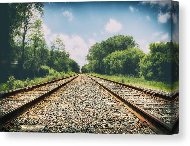 Train Tracks Canvas Print featuring the photograph Follow The Tracks by Bill and Linda Tiepelman