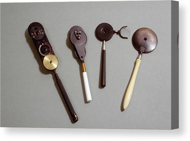 Grey Background Canvas Print featuring the photograph Four Ophthalmoscopes by Science Photo Library