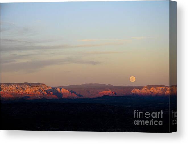 Full Moon Canvas Print featuring the photograph Full Moonrise over Red Rocks of Sedona by Ron Chilston