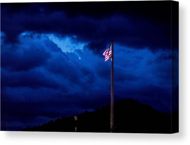 American Flag Canvas Print featuring the photograph Gave proof through the night that our flag was still there. by Donald J Gray