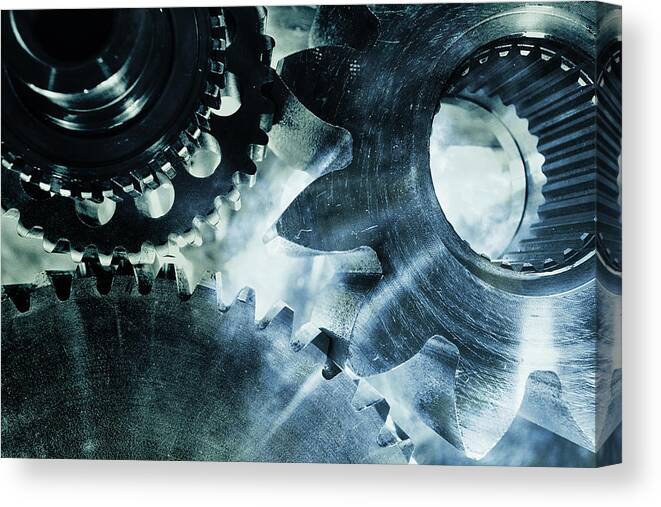Gears Canvas Print featuring the photograph Gears And Cogwheels by Christian Lagereek