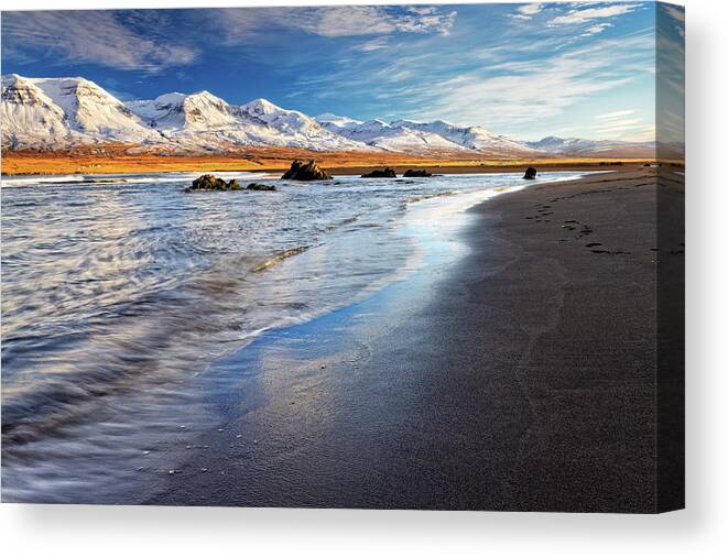 Water's Edge Canvas Print featuring the photograph Golden Hour On Beach At Vopnafjordur by Anna Gorin