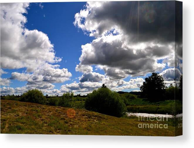 Clouds Canvas Print featuring the photograph Golden Orb by Johanne Peale