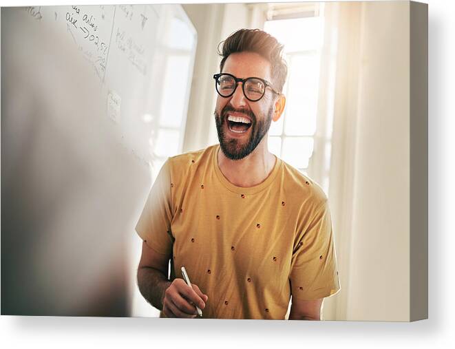 Expertise Canvas Print featuring the photograph He's the one that brings humour to the team by Cecilie_Arcurs