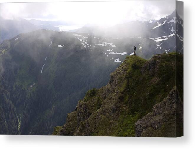 Daytime Canvas Print featuring the photograph Hiker On Eagle Peak Promontory by Joel Bennett