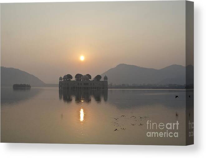 Sunrise Canvas Print featuring the photograph Jal Mahal in sunrise by Elena Perelman