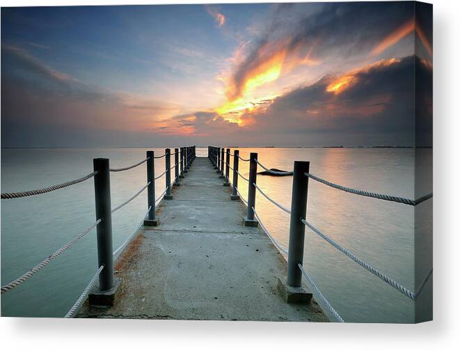 Tranquility Canvas Print featuring the photograph Jetty by Shahrulnizamks