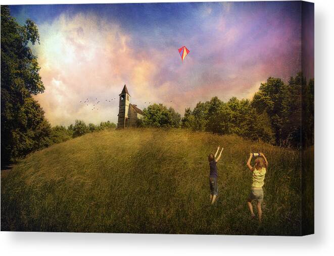 Children Canvas Print featuring the photograph Kite Flying by John Rivera