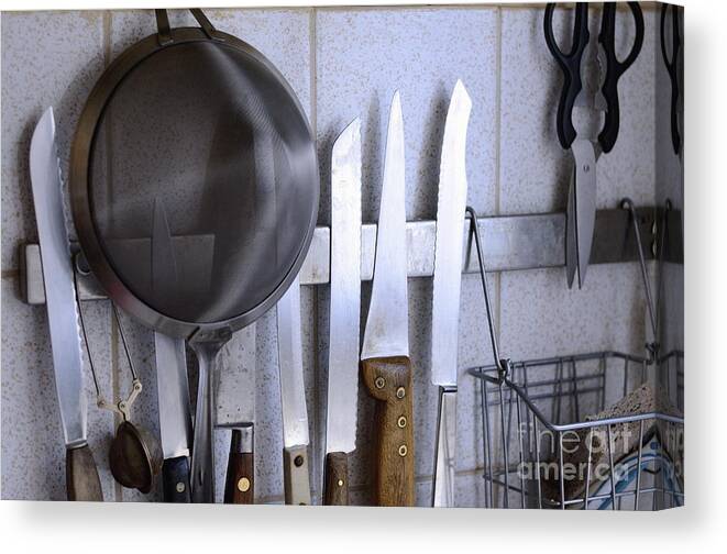 Access Canvas Print featuring the photograph Knives and kitchenware hanging by Sami Sarkis
