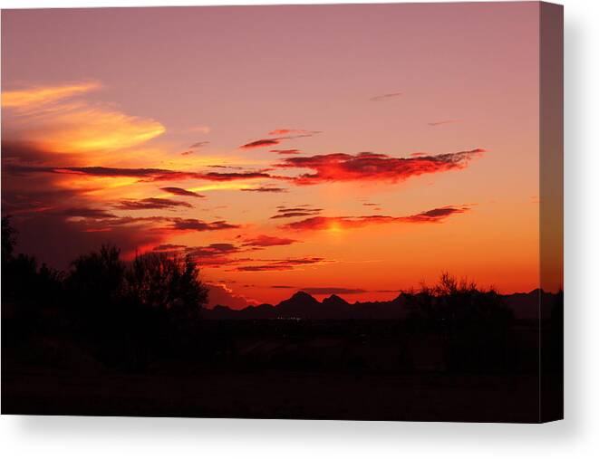 Last Night's Sunset Canvas Print featuring the photograph Last Night's Sunset by Kume Bryant