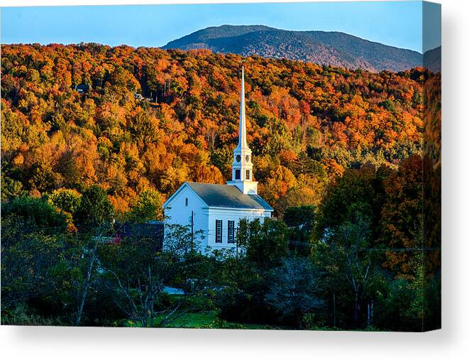 Autumn Foliage New England Canvas Print featuring the photograph Last rays of autumn sun on Stowe Church by Jeff Folger