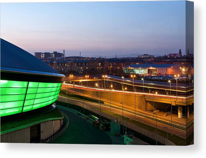 Cityscape Canvas Print featuring the photograph Light trails on the expressway by Stephen Taylor