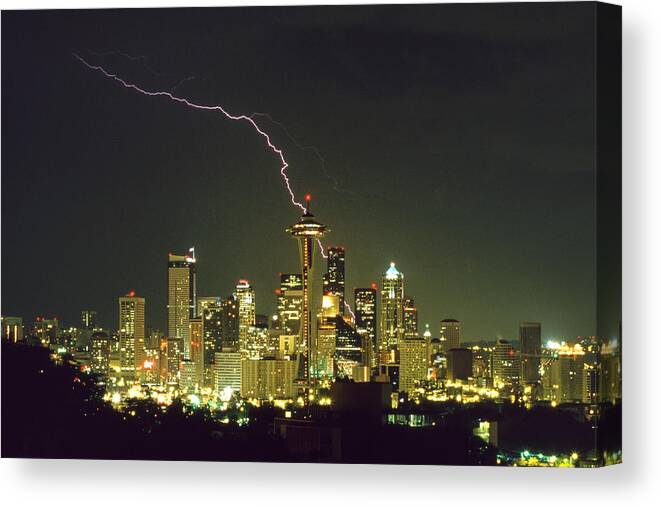 Lightning Canvas Print featuring the photograph Lightning strike in city of Seattle by King Wu