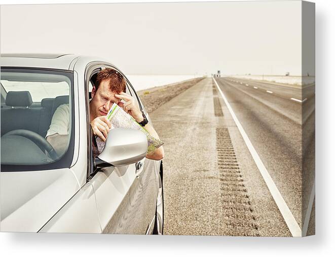 Problems Canvas Print featuring the photograph Lost Motorist Reading Map by Jhorrocks