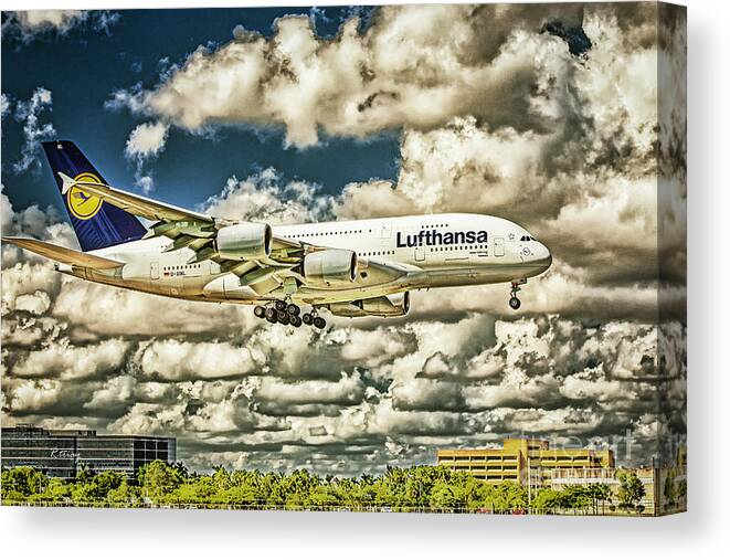 Airbus A380 Canvas Print featuring the photograph Lost in the Clouds Lufthansa A380 Named Hamburg-Colorized Abstract by Rene Triay FineArt Photos