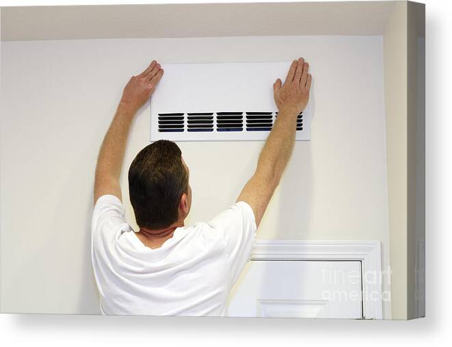 Man Canvas Print featuring the photograph Man Covering Air Vent by Lee Serenethos