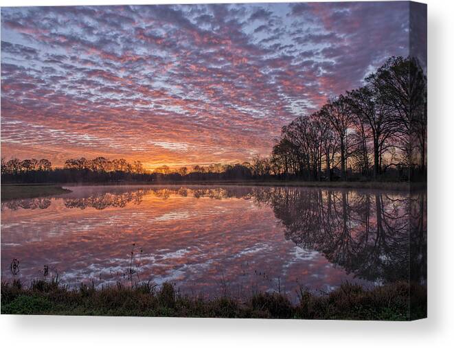 Sunrise Canvas Print featuring the photograph March Sunrise in a little Town called Sunset by Bonnie Barry