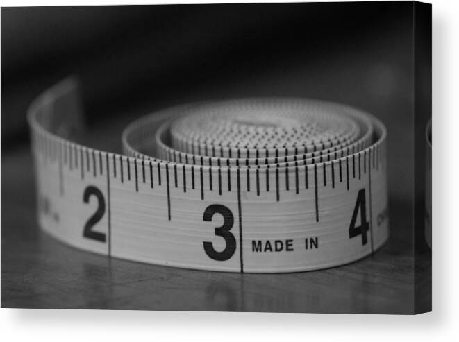 Tape Measure Canvas Print featuring the photograph Measuring Up by Holden The Moment