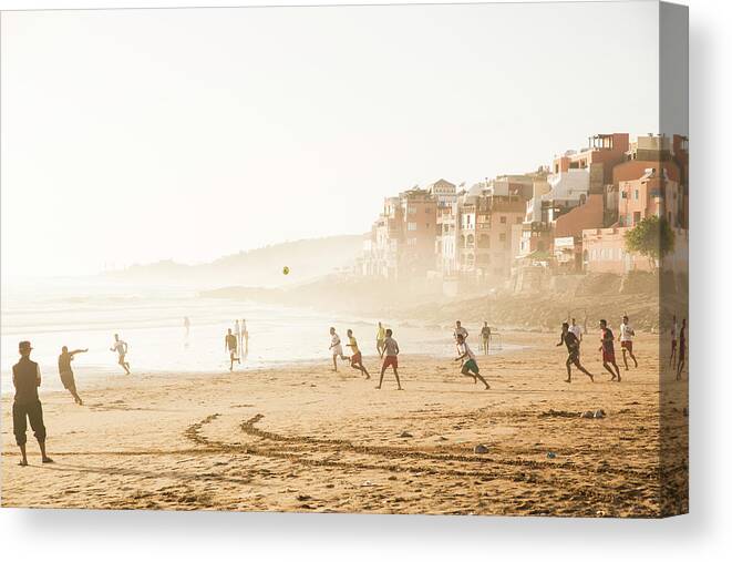 Agadir Canvas Print featuring the photograph Men Playing Football On The Beach by Tim E White