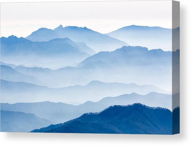 Landscape Canvas Print featuring the photograph Misty Mountains by Gwangseop Eom