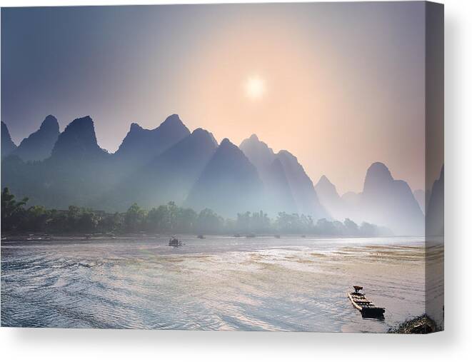 Guangxi Canvas Print featuring the photograph Misty sunrise 2 by Afrison Ma