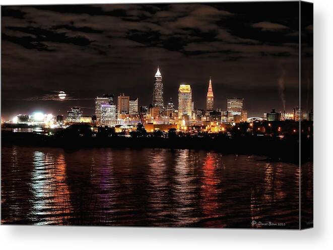 Beaver Moon Canvas Print featuring the photograph Moonrise over Cleveland Skyline by Daniel Behm