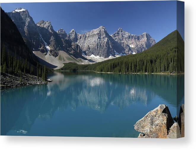 Scenics Canvas Print featuring the photograph Moraine Lake, In Banff Alberta by J.p.andersen Images