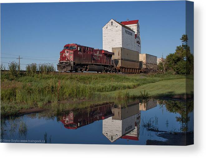 Landscape Canvas Print featuring the photograph Train Reflection at Mortlach Saskatchewan Grain Elevator by Steve Boyko