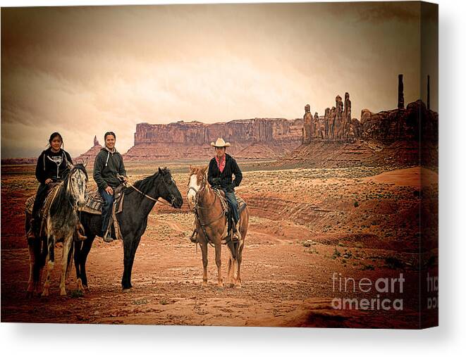Red Soil Canvas Print featuring the photograph Navajo Riders by Jim Garrison