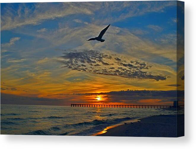 Landscape Canvas Print featuring the photograph Navarre Beach and Pier Sunset Colors with Gulls and Waves by Jeff at JSJ Photography