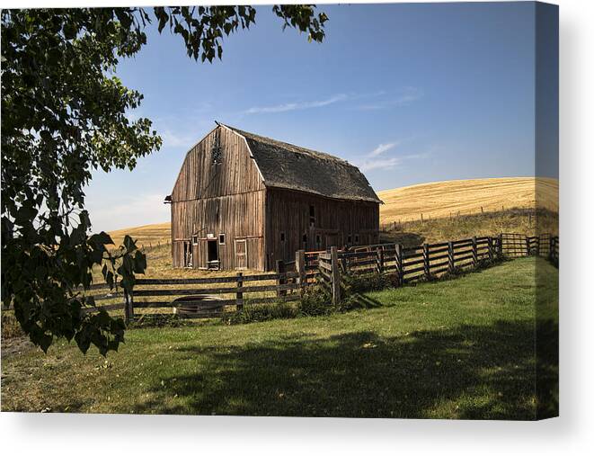 old Barn Canvas Print featuring the photograph Old Barn On The Palouse by Paul DeRocker