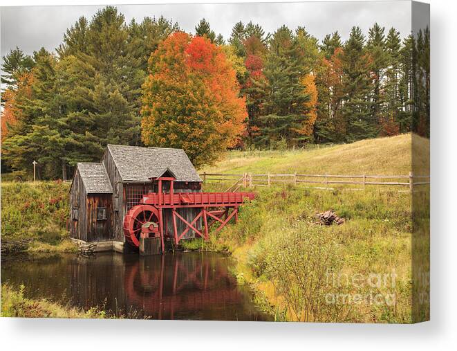 New England Canvas Print featuring the photograph Old New England grist mill in Autumn by Ken Brown