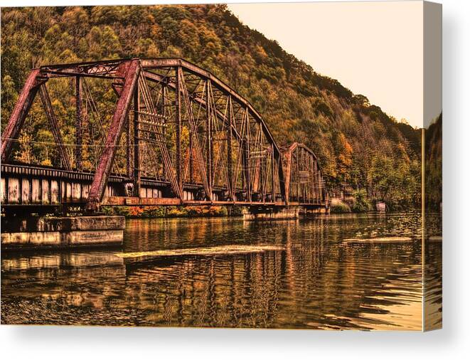 River Canvas Print featuring the photograph Old Railroad Bridge with Sepia Tones by Jonny D