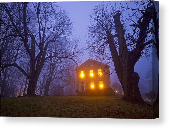 Tranquility Canvas Print featuring the photograph Old stone house on foggy night by Matt Champlin